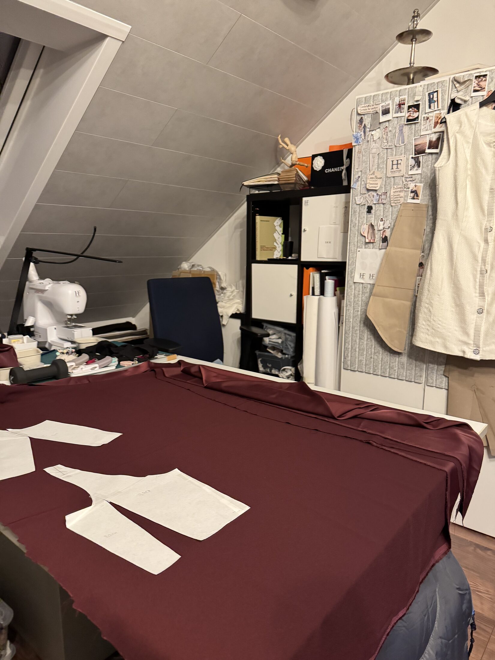 Work in progress garment pinned during studio fitting